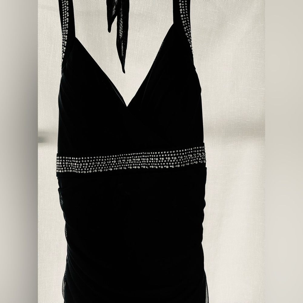Elegant cocktail dress Black with silver sequins. Wore only once.
